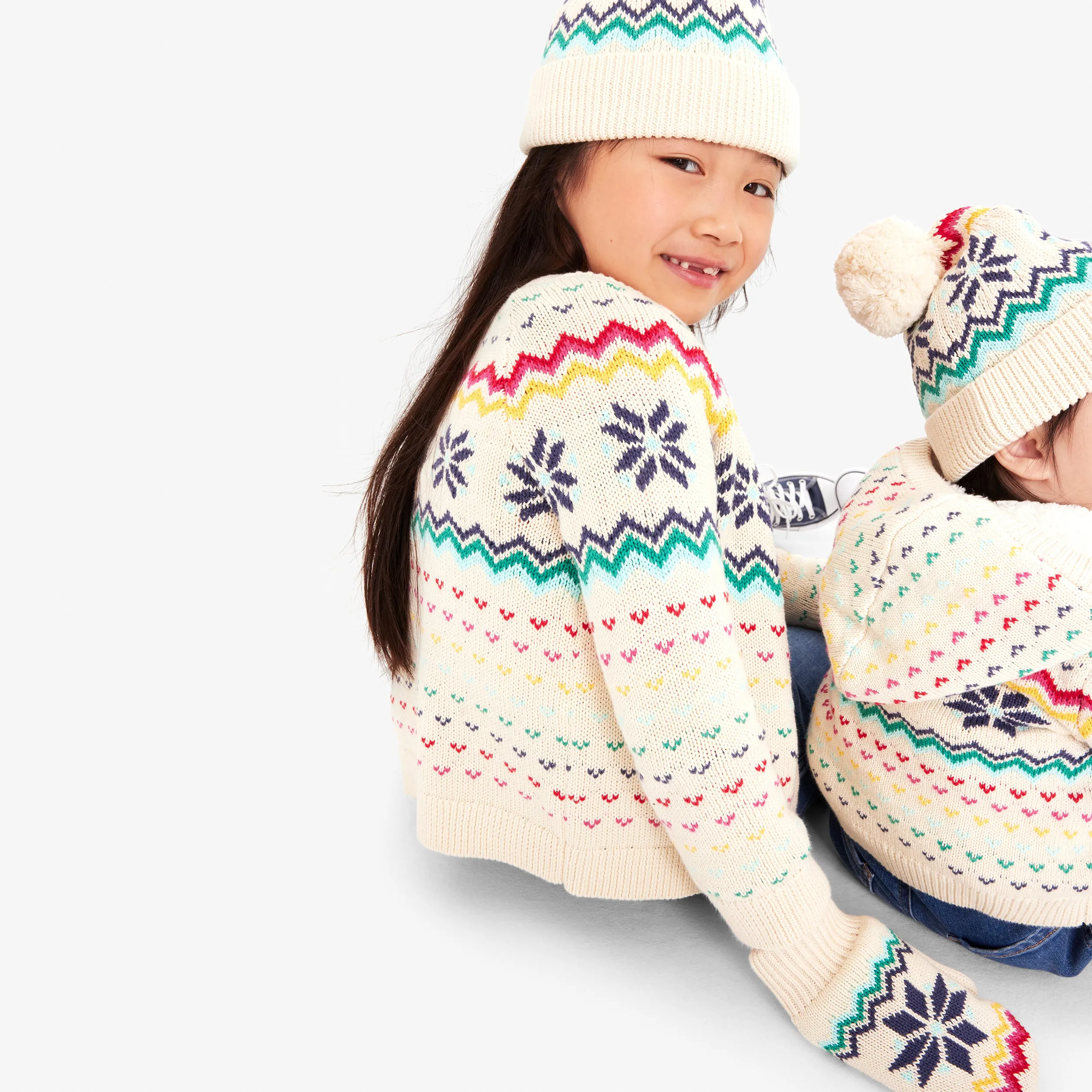 Kids fleece-lined rainbow snowflake fair isle mittens